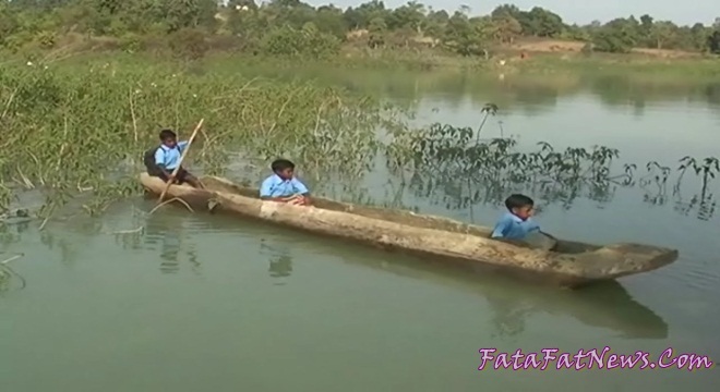 Children forced to cross the river by boat